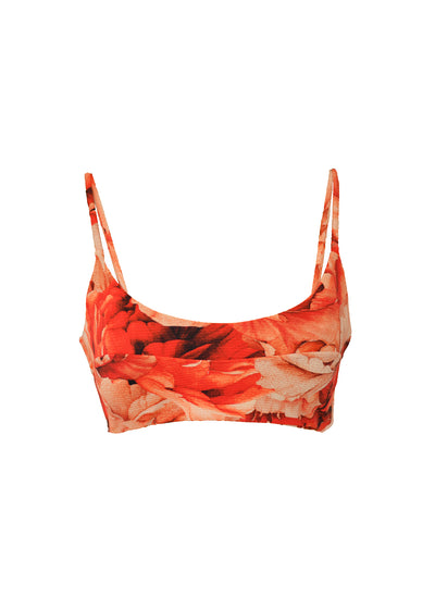 A  ribbed red floral pattern bikini crop top with seam detail across the bust and thin straps. The bikini top is made from sustainable, recycled material